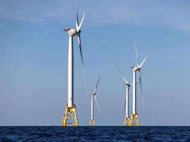 (FILES) Wind turbines generate electricity at the Block Island Wind Farm on July 7, 2022 near Block Island, Rhode Island. They're âuglyâ, âruin the landscapeâ and âkill whalesâ: Donald Trump accuses wind turbines of all sorts of evils and plunged their industry into turmoil as soon as he returned to the White House. âWe're not going to do the windmill thing,â the American president launched on January 20, the day of his inauguration, before digressing on the subject. âThey kill birds and ruin beautiful landscapesâ, âthey're all made in Chinaâ and âif you like whales, you don't want wind turbines eitherâ, said the Republican, before signing a series of executive orders at the end of the day to put a spanner in the industry's works. (Photo by JOHN MOORE / GETTY IMAGES NORTH AMERICA / AFP)