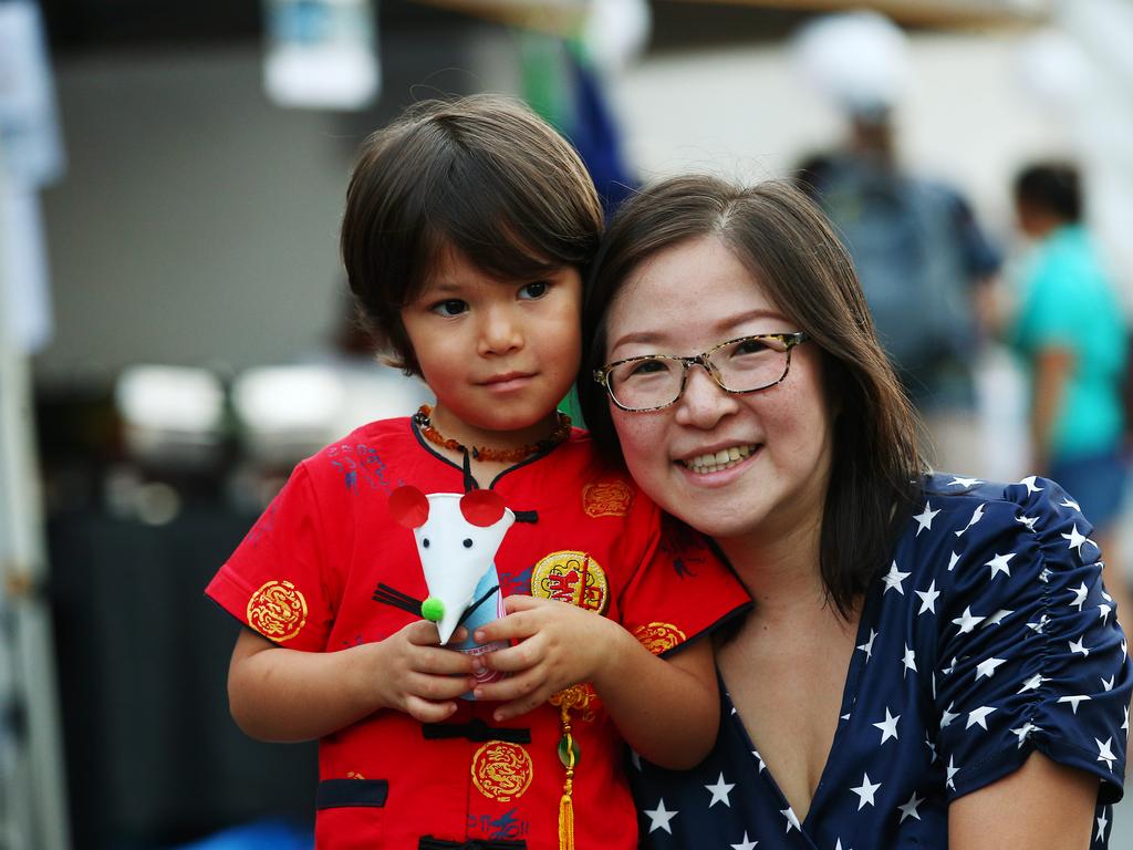 Giacomo Mancini, 3, and Maggie Mancini at the Cairns and District Chinese Association Inc Chinese New Year street festival on Grafton Street. PICTURE: BRENDAN RADKE