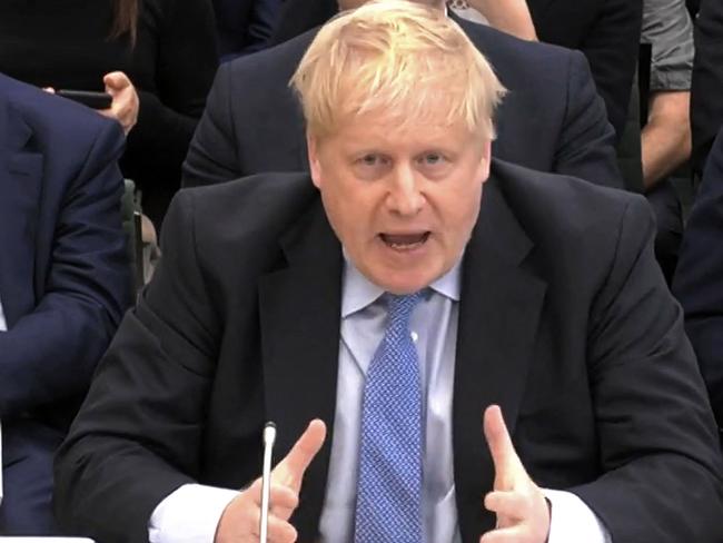 A video grab from footage broadcast by the UK Parliament's Parliamentary Recording Unit (PRU) shows former British Prime Minister Boris Johnson making his opening statement as he attends a Parliamentary Privileges Committee hearing, in central London on March 22, 2023. - Britain's Parliament on Wednesday opened an inquisition of former prime minister Boris Johnson about "Partygate" that could decide his political future. (Photo by PRU / AFP) / RESTRICTED TO EDITORIAL USE - NO USE FOR ENTERTAINMENT, SATIRICAL, ADVERTISING PURPOSES - MANDATORY CREDIT " AFP PHOTO / PRU "