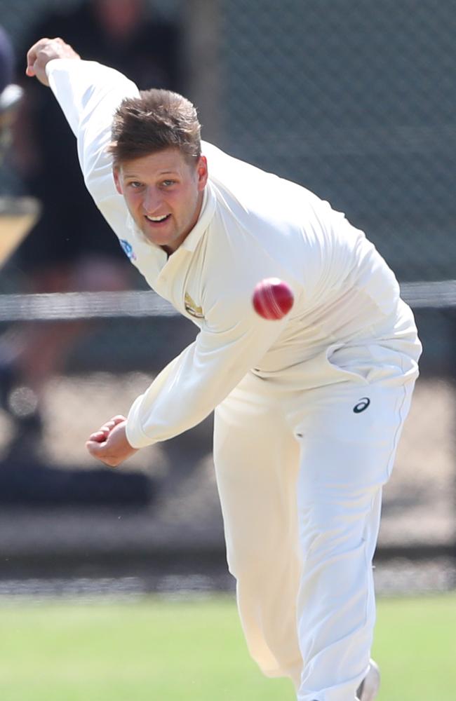 Alexander Jones bowling for Oakleigh.