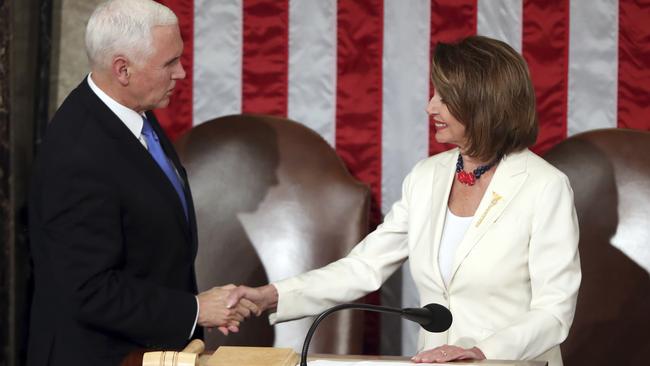 House Speaker Nancy Pelosi greets Vice President Mike Pence. Picture: AP.