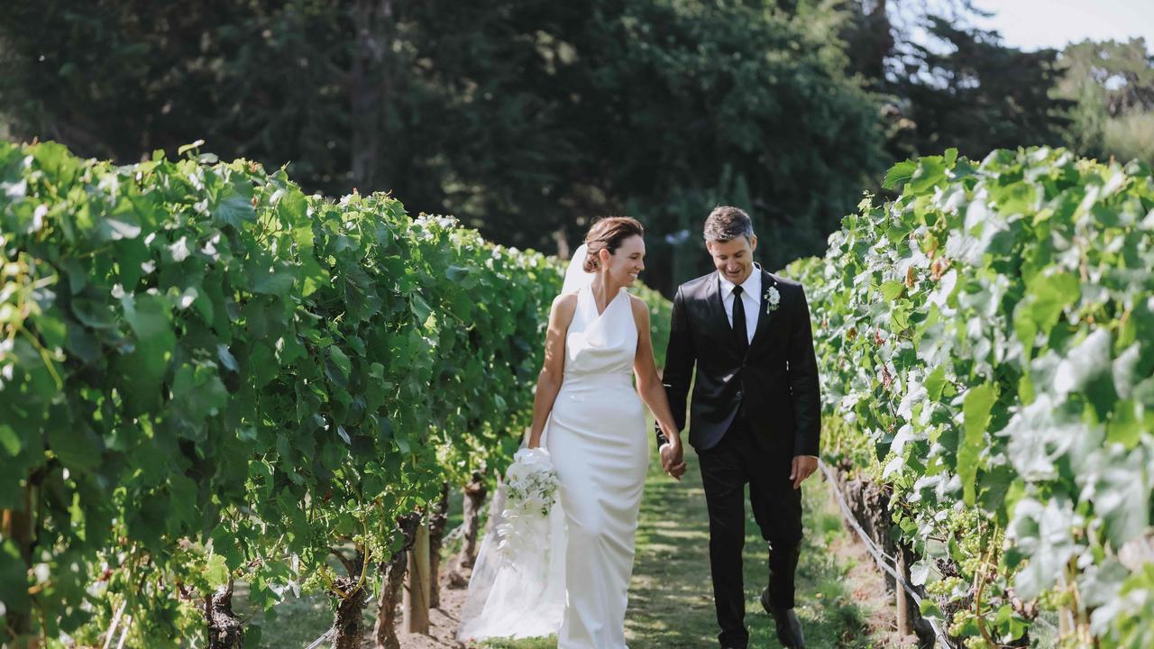 New Zealand's former prime minister Jacinda Ardern standing with her husband Clarke Gayford during their wedding ceremony in Hawke's Bay at Craggy Range Winery, on the east coast of North Island.