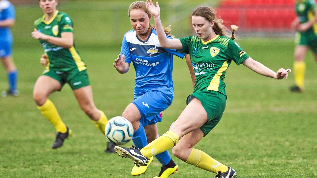 IN ACTION: South West Queensland Thunder player Emma Jackson (left) moves to shut down Mitchelton opponent Georgia Buchanan. Picture: Nev Madsen