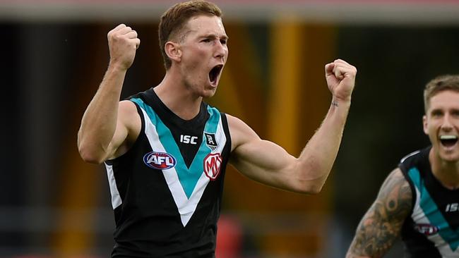 Port Adelaide finished full of running to defeat GWS Giants and maintain top spot.