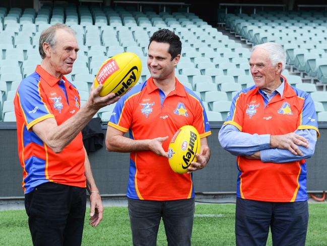 Graham Cornes, Gavin Wanganeen and Neil Kerley discuss tactics at Adelaide Oval, ahead of the 2018 EJ Whitten Legends game. Photo: AAP Image/ Brenton Edwards.