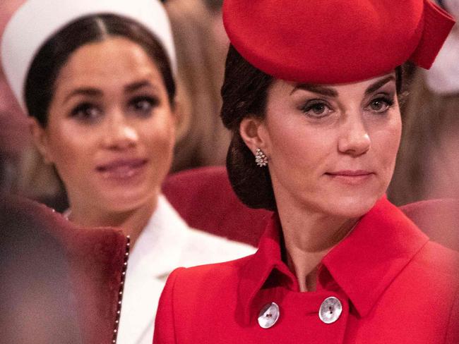 Britain's Meghan, Duchess of Sussex (L) and Britain's Catherine, Duchess of Cambridge, (R) attend the Commonwealth Day service at Westminster Abbey in London on March 11, 2019. - Britain's Queen Elizabeth II has been the Head of the Commonwealth throughout her reign. Organised by the Royal Commonwealth Society, the Service is the largest annual inter-faith gathering in the United Kingdom. (Photo by Richard Pohle / POOL / AFP)