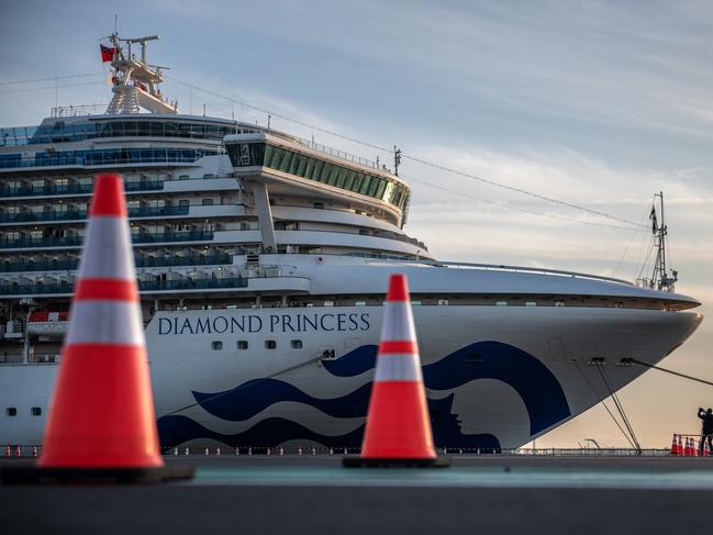 The Diamond Princess cruise ship sits docked at Daikoku Pier where it is being resupplied and newly diagnosed coronavirus cases taken for treatment as it remains in quarantine. Picture: Getty