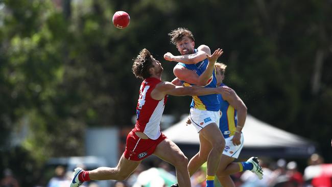 Aaron Young of the Suns handballs during the 2019 JLT Community Series AFL match between the Sydney Swans and the Gold Coast Suns at Oakes Oval on March 10, 2019 in Lismore, Australia. (Photo by Matt King/Getty Images)