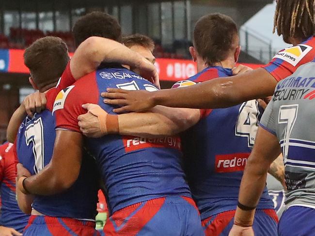 NEWCASTLE, AUSTRALIA - FEBRUARY 21: Knights players celebrate a try from Jirah Momoisea during the NRL Trial match between the Canterbury Bulldogs and the Newcastle Knights at McDonald Jones Stadium on February 21, 2022 in Newcastle, Australia. (Photo by Ashley Feder/Getty Images)