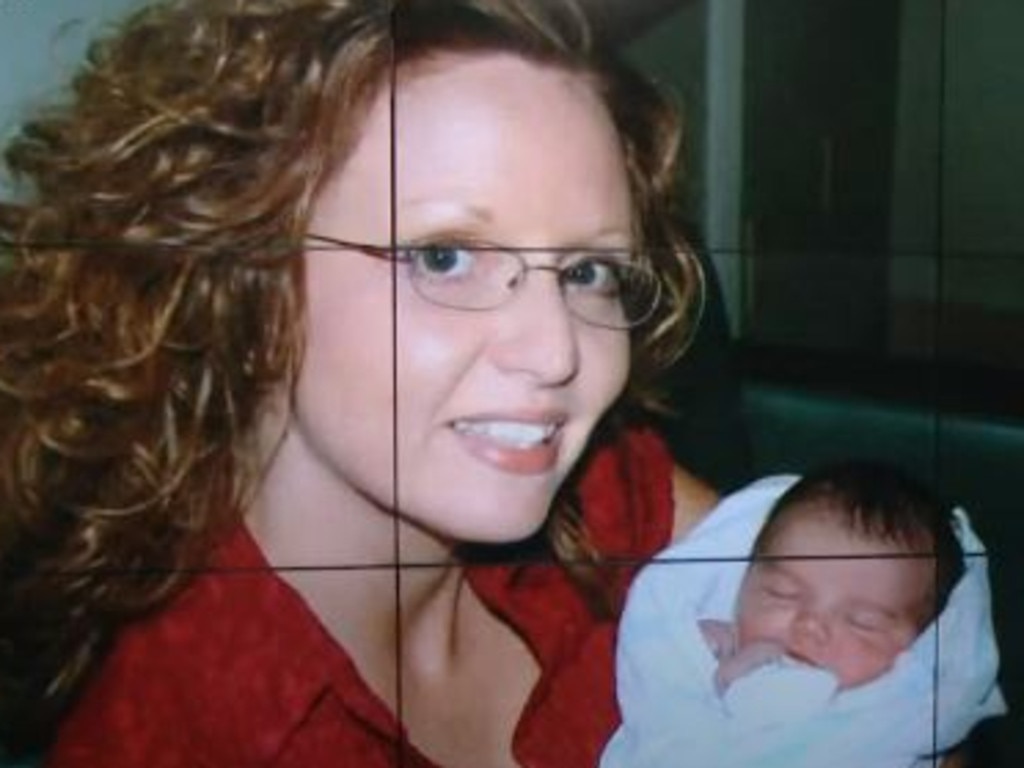 Michele holding Kaitlin the day she was born in June 2008.