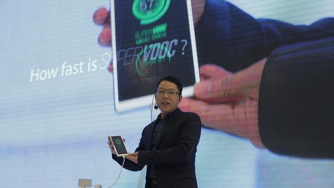 Phone maker OPPO demonstrates its fast charging technology at Barcelona’s Mobile World Congress.