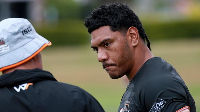 Thomas Mikaele talks to coach Michael Maguire ahead of the clash with Manly. Picture: Toby Zerna