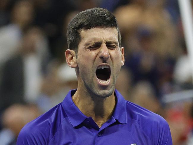 *** BESTPIX *** NEW YORK, NEW YORK - SEPTEMBER 10: Novak Djokovic of Serbia celebrates winning match point to defeat Alexander Zverev of Germany during their MenÃ¢â¬â¢s Singles semifinal match on Day Twelve of the 2021 US Open at the USTA Billie Jean King National Tennis Center on September 10, 2021 in the Flushing neighborhood of the Queens borough of New York City. (Photo by Sarah Stier/Getty Images)