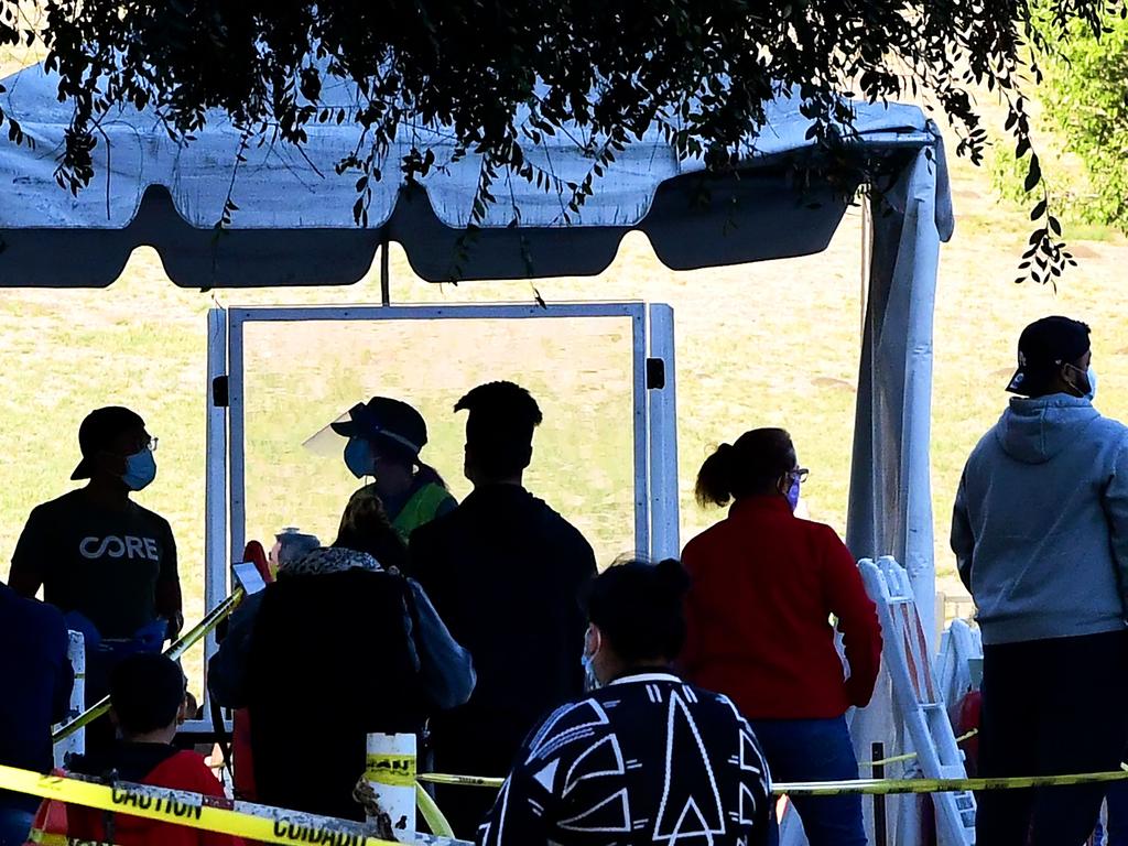 People wait in line to get a COVID test in LA. Picture: AFP