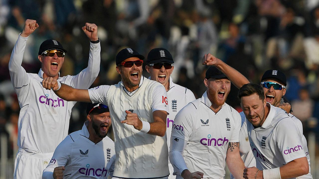 England's players celebrate after the dismissal of Pakistan's Salman Ali Agha. (Photo by Aamir QURESHI / AFP)