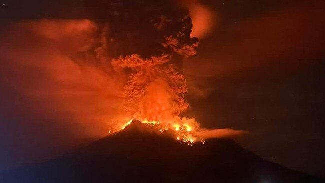 Mount Ruang releasing hot lava and smoke in Sangihe Islands as seen from Sitaro, North Sulawesi. Picture: AFP