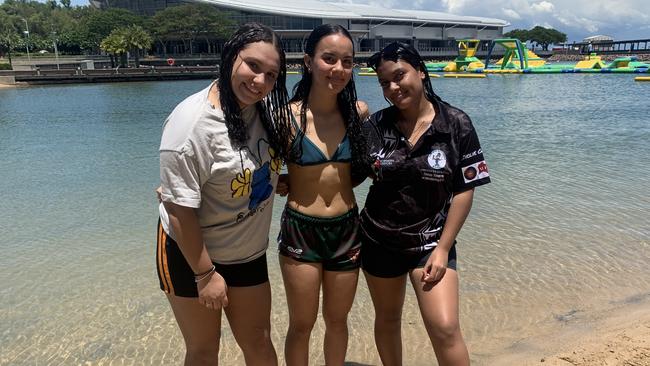 Anica Tadic, Aniesha Bowie, and Marley Morgan spent three hours swimming in the Darwin Waterfront beach to beat the heat. Picture: Sierra Haigh