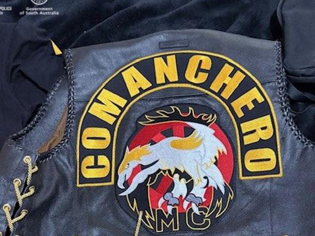 South Australian police have arrested a bikie wearing a Comanchero OMCG vest after he failed to stop for police. He was later found to be in possession of a loaded pistol and a quantity of methamphetamine. Picture: SAPOL