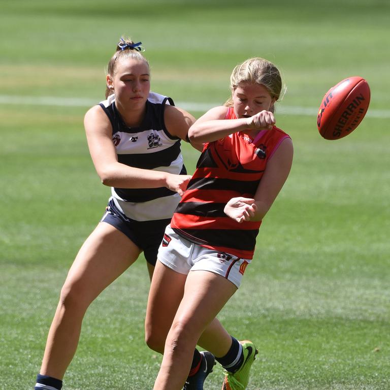 Junior under 15 Girls AFL Final between Broadbeach and Burleigh. Burleigh's Amity Bamberry and Broadbeach's Caitlin Wallis. (Photo/Steve Holland)