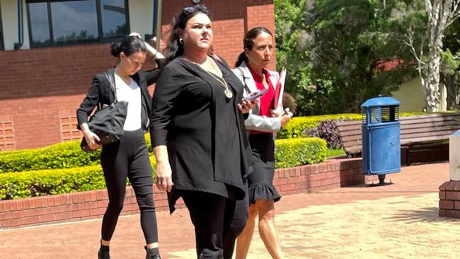 Marnie Went, pictured centre and clad in full black, leaves Cleveland Magistrates Court. Picture: Marcel Baum