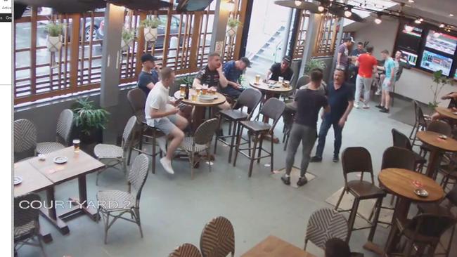 Irishman Patrick Farrell fronts up to man in beer garden.