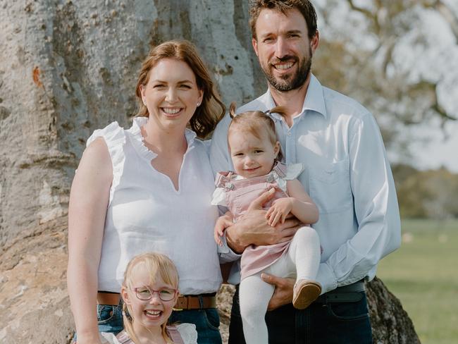 Sally Beck with husband James and daughters Paige and Chloe.Picture: Supplied.