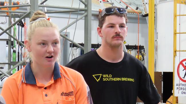 Apprentice plumber Halle Whitehead and carpenter Daniel Richardson and speak to the media at Cambridge on Wednesday, December 18, 2024.