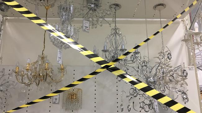 What looks like crime scene tape bars access to display lights.