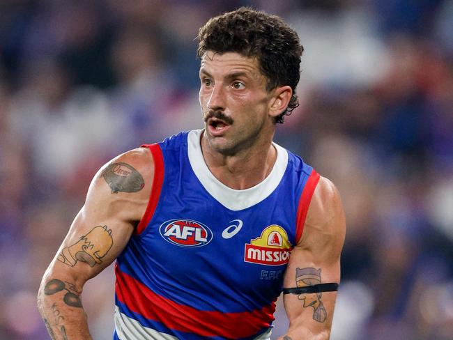 MELBOURNE, AUSTRALIA - MARCH 31: Tom Liberatore of the Bulldogs in action during the 2024 AFL Round 03 match between the Western Bulldogs and the West Coast Eagles at Marvel Stadium on March 31, 2024 in Melbourne, Australia. (Photo by Dylan Burns/AFL Photos via Getty Images)