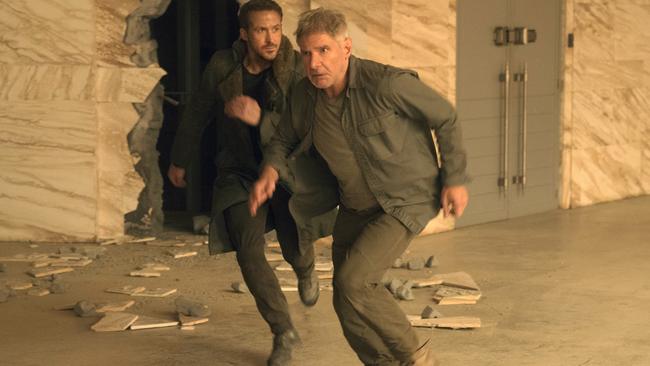 Officer K (Ryan Gosling) and Rick Deckard (Harrison Ford) in a scene from Blade Runner 2049.