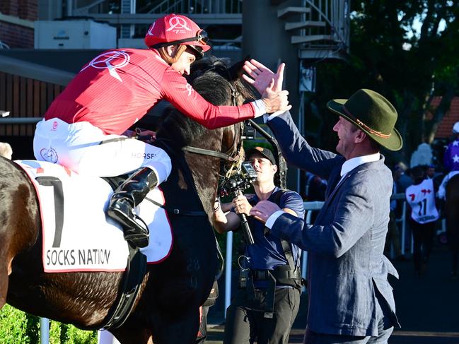 Ryan Maloney and Ciaron Maher cause a Group 1 Queensland Oaks boilover with Socks Nation at Eagle Farm. Picture: Grant Peters - Trackside Photography