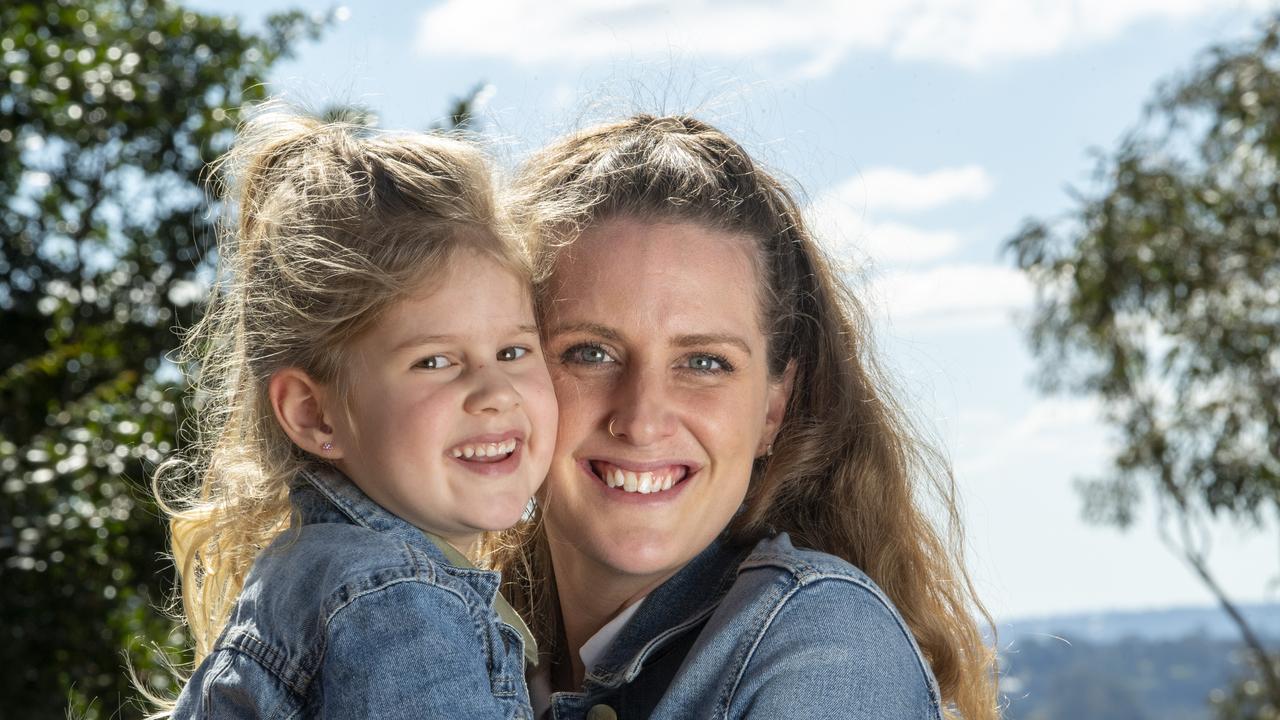 Hannah Golding and her five year old daughter Arabella enjoy a warm August day at Picnic Point. Picture: Nev Madsen.