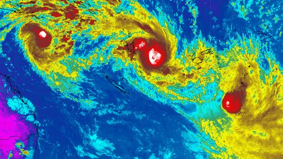 Satellite imagery captured a rare image of three cyclones swirling over the South Pacific. Picture: Weatherzone