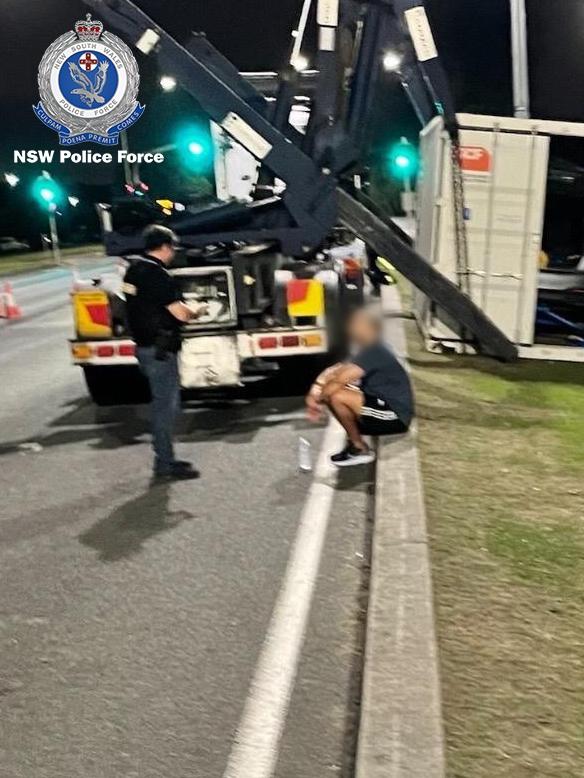 Baluch during his arrest after being discovered in a shipping container on a truck.