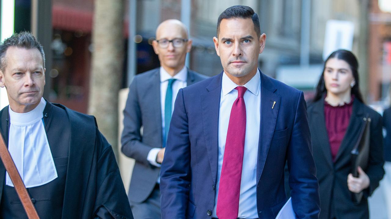 Sydney MP Alex Greenwich arriving at the Federal Court on Thursday, alongside his legal team. Picture: NewsWire/ Christian Gilles