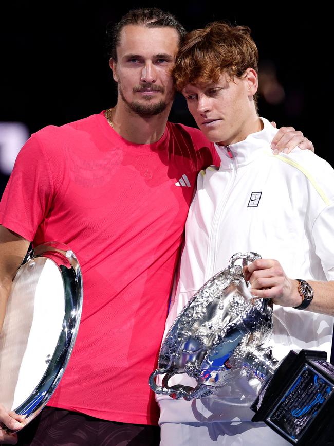 Jannik Sinner and runners up Alexander Zverev after the 2025 Australian Open final. Photo by Martin KEEP / AFP.