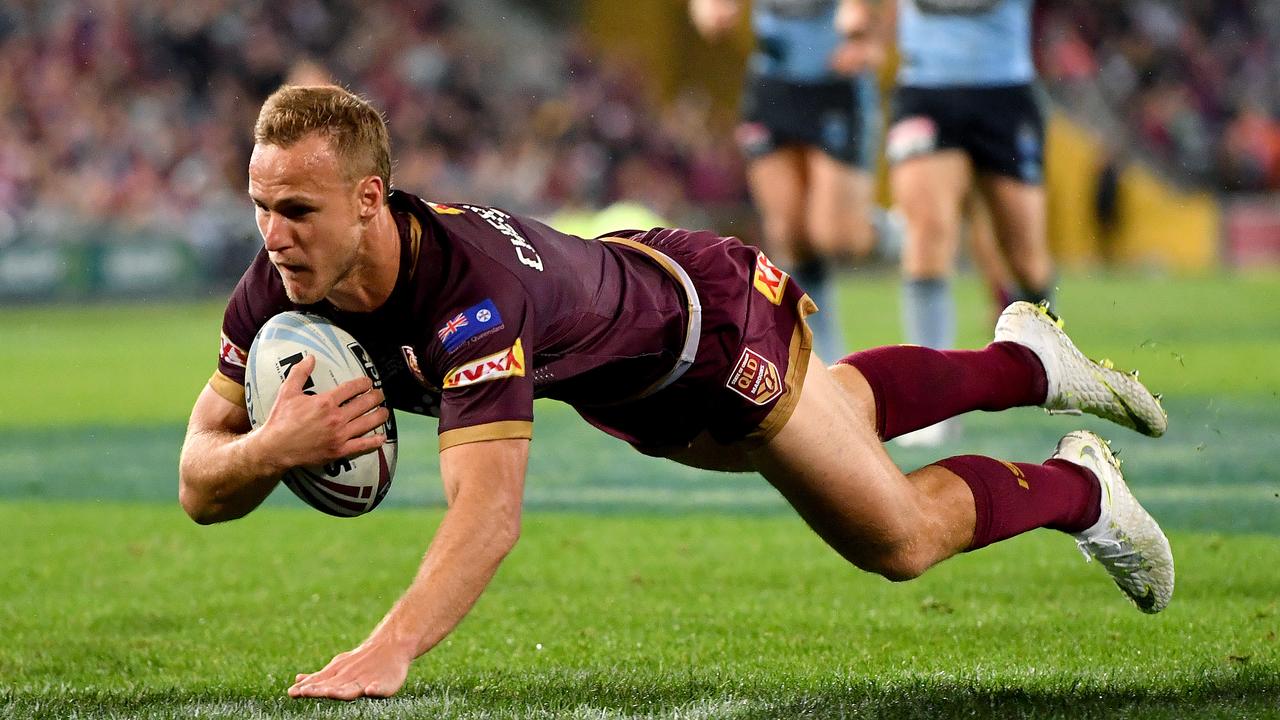 Daly Cherry-Evans of the Maroons scores a try during Game 3 of the 2018 State of Origin series