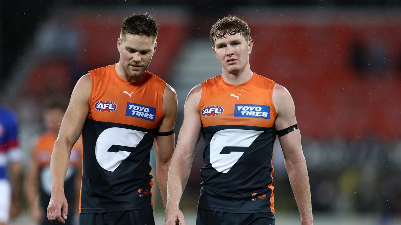 Tommy Green (right), alongside GWS teammate Harry Himmelberg, has slammed his perceived bias towards Victorian sides in the AFL. (Photo by Matt King/AFL Photos/via Getty Images )