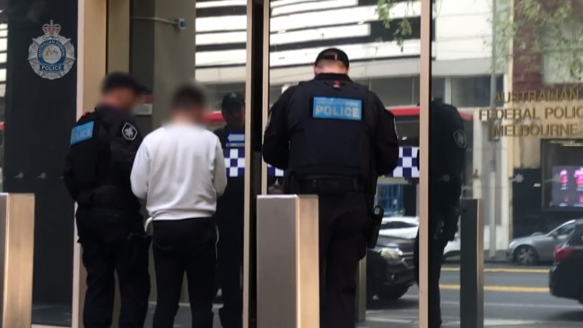 Victoria Police arrested two men who allegedly stashed liquid MDMA ...