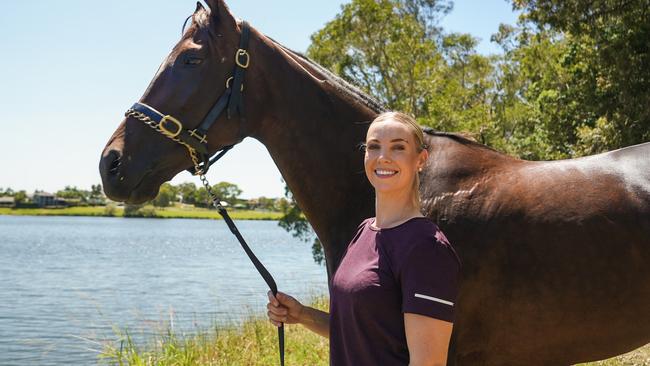 Renita Beaton used to ride track work in Hong Kong before moving back to Queensland to take up training. Picture: Supplied. Picture: Racing Queensland