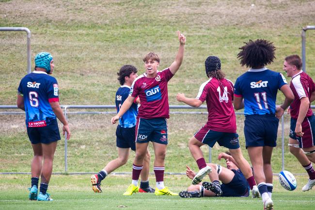 Oliver Kennedy celebrates after scoring a stunning try. The ball had ricochet off the leg of Aiden Luke and spun into the in-goal area where Kennedy planted the ball just shy of the dead-ball line. Picture credit: QRU Media/ Anthony Wingard.