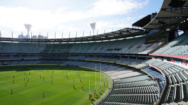 Clarko’s Hawks took on Brisbane in front of empty MCG stands. Picture: AAP