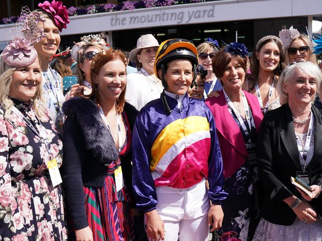 Jockey Michelle Payne with connections before race one. Picture: AAP Image/Michael Dodge