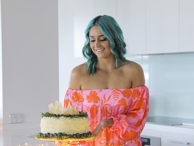 QWeekend - five celebrities share their favourite/significant Christmas recipes.Amy Sheppard,  of band Sheppard, cooks an Christmas-themed apple cake, a dessert her family enjoys every year. Pic mark Cranitch