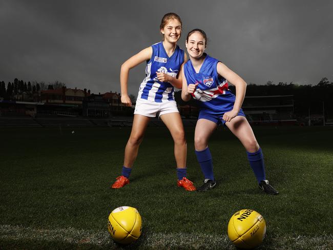 Captains from under 13's girls STJFL teams who will be playing in the grand final this weekend Sandy Bay's Lucy Groom, 13, and Claremont's Sarah Midgley, 13. Picture: Zak Simmonds