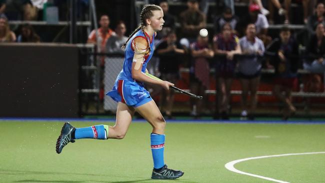 Saints' Talytha Macdonald juggles the ball forward in the penalty shootout, but is stopped by Brothers goal keeper Ella McLeod in a tense finish to the Cairns Hockey Association Under 18A Women's match between Brothers and Saints. PICTURE: BRENDAN RADKE