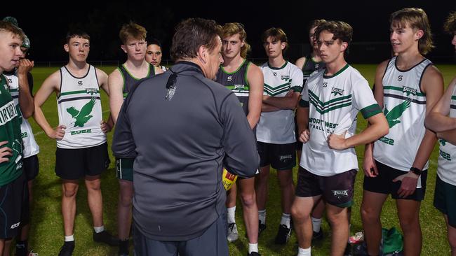 Mark ‘Bomber’ Thompson puts the Airport West under-18s through their paces. Picture: Josie Hayden