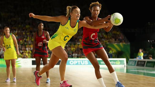 Australia against England in the netball — Liz Watson up against UK’s Serena Guthrie at the Games last year. Picture: Scott Barbour/Getty