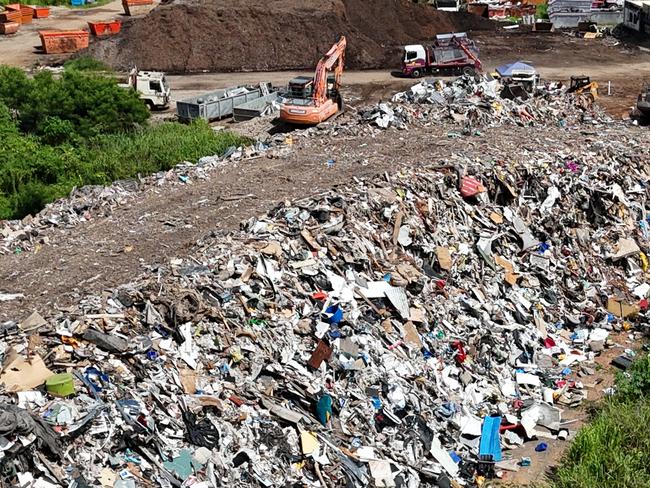 The Department of the Environment has taken action against Enviroland for breaches of licence regulations that limit the size of waste stockpiles at the Lower Freshwater Rd site. Picture: Supplied