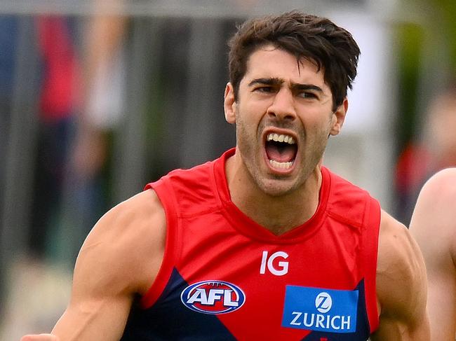 MELBOURNE, AUSTRALIA - FEBRUARY 18: Christian Petracca of the Demons celebrates a goal during an AFL practice match between Melbourne Demons and Richmond Tigers at Casey Fields on February 18, 2024 in Melbourne, Australia. (Photo by Morgan Hancock/Getty Images)